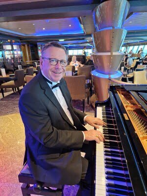 Robert Baker playing piano on Ventura